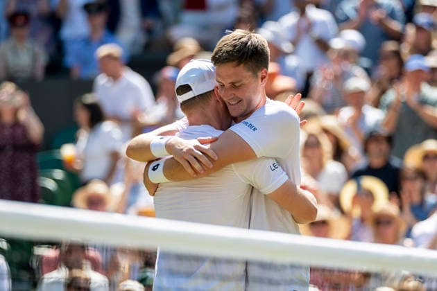 (260712) -- LONDON, July 12, 2026 -- Harri Heliovaara Henry Patten (R) celebrate winning the men s doubles final match between Harri Heliovaara (Finland) Henry Patten (Britain) and Marcelo Arevalo (El Salvador) Mate Pavic (Croatia) at the Wimbledon Tennis Championships in London, Britain, on July 11, 2026. (Photo by Xinhua) (SP)BRITAIN-LONDON-TENNIS-WIMBLEDON-MEN S DOUBLES StephenxChung 