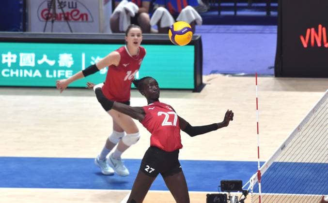 (260712) -- HONG KONG, July 12, 2026 -- Nyadholi Thokbuom (front) of Canada spikes the ball during the match between Canada and the Dominican Republic at the Women s Volleyball Nations League (VNL) 2026 in Hong Kong, south China, July 12, 2026. ) (SP)CHINA-HONG KONG-VOLLEYBALL-NATIONS LEAGUE-WOMEN-CAN VS DOM (CN) LoxPingxFai 