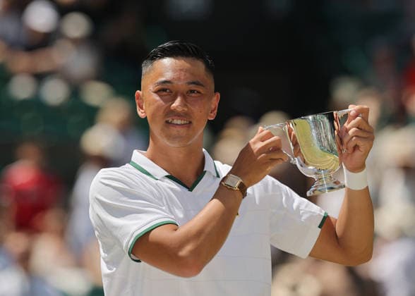 RECORD DATE NOT STATED 12th July 2026; All England Lawn Tennis and Croquet Club, London, England; Wimbledon Tennis Tournament, Final Day; Tokito Oda (JPN) lifts the Gentlemens Wheelchair Single trophy after defeating Alfie Hewett (GBR) JohnxPatrickxFletcher