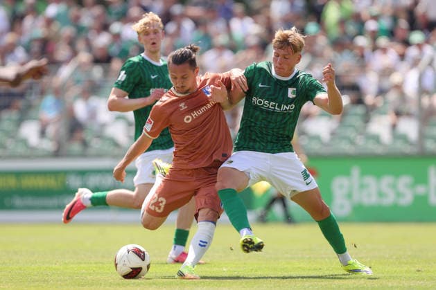 12.07.2026, xtgx, Fussball Testspiel, BSG Chemie Leipzig - 1. FC Magdeburg emspor, v.l. Baris Atik (Magdeburg, 23), Rajk Lisinski (Chemie Leipzig, 27) Zweikampf, Duell, Kampf, tackle (DFL DFB REGULATIONS PROHIBIT ANY USE OF PHOTOGRAPHS as IMAGE SEQUENCES and or QUASI-VIDEO) Leipzig *** July 12, 2026, xtgx, soccer exhibition match, BSG Chemie Leipzig vs. 1. FC Magdeburg emspor, from left: Baris Atik (Magdeburg), 23, Rajk Lisinski (Chemie Leipzig), 27, tackle, duel, battle, DFL DFB REGULATIONS PROHIBIT ANY USE OF PHOTOGRAPHS AS IMAGE SEQUENCES AND OR QUASI-VIDEO, Leipzig