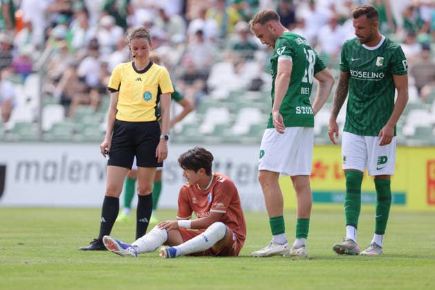 12.07.2026, xtgx, Fussball Testspiel, BSG Chemie Leipzig - 1. FC Magdeburg emspor, v.l. Do Young Yoon (Magdeburg, 27) verletzt, Verletzung, injury, injured (DFL DFB REGULATIONS PROHIBIT ANY USE OF PHOTOGRAPHS as IMAGE SEQUENCES and or QUASI-VIDEO) Leipzig *** July 12, 2026, xtgx, Soccer friendly match, BSG Chemie Leipzig vs. FC Magdeburg emspor, from left: Do Young Yoon (Magdeburg), 27, injured, injury, injured. DFL and DFB regulations prohibit any use of photographs as image sequences and or quasi-video. Leipzig