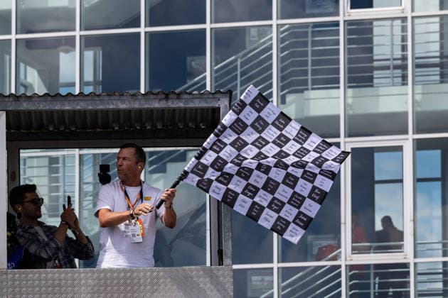 GER, Großer Preis von Deutschland, MotoGP. 11. Lauf, FIM Motorrad-Weltmeisterschaft. 12.07.2026, Sachsenring, Hohenstein-Ernstthal, GER, Großer Preis von Deutschland, MotoGP. 11. Lauf, FIM Motorrad-Weltmeisterschaft. Lothar Matthäus schwenkt die Zielflagge Â Foto: Alexander Trienitz Hohenstein-Ernstthal Sachsenring Sachsen Deutschland *** GER, German Grand Prix, MotoGP Round 11, FIM Motorcycle World Championship, July 12, 2026, Sachsenring, Hohenstein Ernstthal, GER, German Grand Prix, MotoGP Round 11, FIM Motorcycle World Championship Lothar Matthäus waves the checkered flag. Photo by Alexander Trienitz Hohenstein Ernstthal Sachsenring Saxony Germany