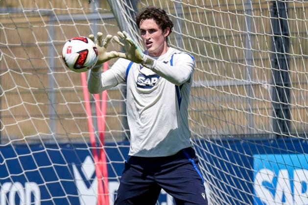 Lukas Petersson (Torwart, Hoffenheim, 36), am Ball, Einzelbild, Einzelfoto, Aktion, Action, 12.07.2026, Zuzenhausen (Deutschland), Fussball, Bundesliga, Trainingsauftakt TSG 1899 Hoffenheim, DFB DFL REGULATIONS PROHIBIT ANY USE OF PHOTOGRAPHS AS IMAGE SEQUENCES AND OR QUASI-VIDEO. *** Lukas Petersson, goalkeeper, Hoffenheim, 36, on the ball, single frame, single photo, action, July 12, 2026, Zuzenhausen, Germany, soccer, Bundesliga, start of training for TSG 1899 Hoffenheim, DFB and DFL regulations prohibit any use of photographs as image sequences and or quasi-video xozx