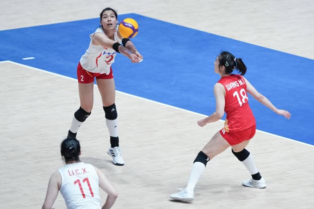 RECORD DATE NOT STATED Volleyball Nations League Hong Kong 2026 - Day 5 Zhuang Yushan (No.2), Li Chenxuan (No.11) and Wang Mengjie (No.18) from team China during the match between Italy and China at Volleyball Nations League Hong Kong 2026 on July 12, 2026 in Hong Kong. (Photo by Ellan Mad Nexpher Images) Hong Kong