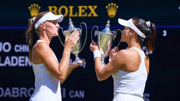 July 12, 2026, London, London, Great Britain: Kristina Mladenovic of France, Hanyu Guo of China presenting their trophies for the Doubles Champions to their family, friends and team during The Championships Wimbledon , 12.7.2026 in London (All England Lawn Tennis and Croquet Club), Great Britain Tennis 2026: Grand Slam: The Championships Wimbledon: 14th Day: Womens Doubles Final: GUA MLADENOVIC 6:3 7:5 DABROWSKI STEFANI  - ZUMAs343 20260712_zsp_s343_022 Copyright: xMathiasxSchulzx
