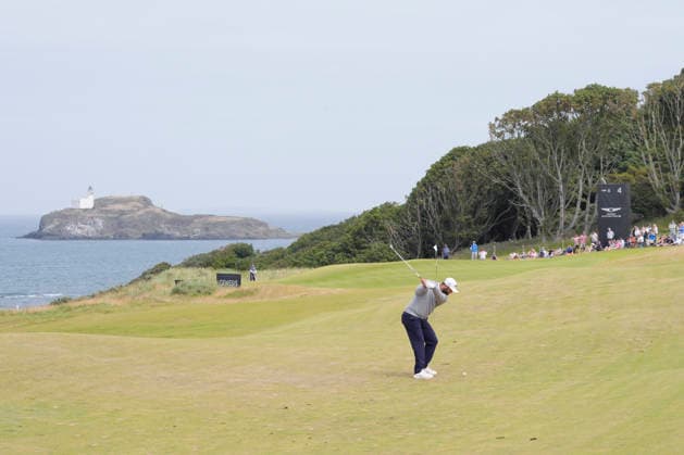 NORTH BERWICK, SCOTLAND - JULY 12: Jon Rahm plays from the second fairway during Round 4 of the Genesis Scottish Open at the Renaissance Club, North Berwick on July 12, 2026 in North Berwick, Scotland Genesis Scottish Open Round 4
