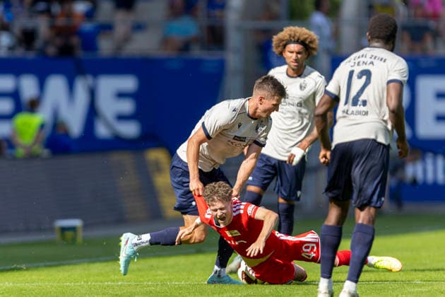 GER, Jena, Fussball, Testspiel, FC Carl-Zeiss Jena vs. 1. FC Union Berlin im Bild v.l.: Moritz Fritz (FC Carl-Zeiss Jena 23), Linus Guether (1. FC Union Berlin 49), Zweikampf 12.07.2026, Ernst-Abbe Sportfeld Jena DFB REGULATIONS PROHIBIT ANY USE OF PHOTOGRAPHS AS IMAGE SEQUENCES AND OR QUASI-VIDEO, *** GER, Jena, Soccer, Friendly Match, FC Carl Zeiss Jena vs. 1. FC Union Berlin (pictured, from left): Moritz Fritz (FC Carl Zeiss Jena, 23), Linus Guether (1. FC Union Berlin, 49), tackle, July 12, 2026, Ernst Abbe Sportfeld, Jena. DFB regulations prohibit any use of photographs as image sequences and or quasi-video, Copyright: HMBxMedia PaulxFritz
