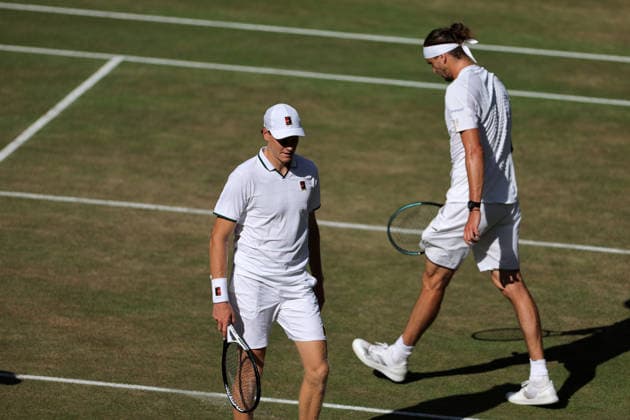 RECORD DATE NOT STATED 12th July 2026; All England Lawn Tennis and Croquet Club, London, England; Wimbledon Tennis Tournament, Final Day; Jannik Sinner (ITA) walking past his opponent Alexander Zverev (GER) JohnxPatrickxFletcher