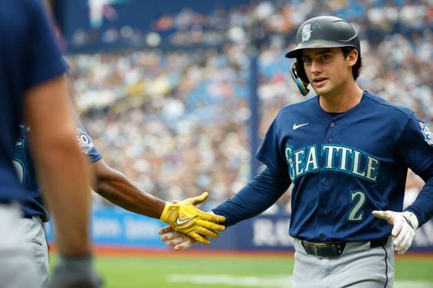 July 12, 2026, St. Petersburg, Florida, USA: Seattle Mariners second baseman Cole Young (2) receives a high-five from teammates, after he scores at home plate against the Tampa Bay Rays during the second inning at Tropicana Field on Sunday, July 12, 2026, in St. Petersburg. St. Petersburg USA - ZUMAs70_ 0861387071st Copyright: xJeffereexWoox