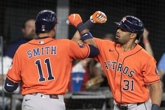July 12, 2026, Arlington, Texas, USA: Houston Astros left fielder LAMONTE WADE JR. (31) congratulates Houston Astros right fielder CAM SMITH (11) on a homerun during a MLB, Baseball Herren, USA game between the Houston Astros and Texas Rangers at Globe Life Field. Rangers win 6-5. MLB 2026: Rangers 6:5 Astros  - ZUMAf180 20260712_zsp_f180_020 Copyright: xMarkxFannx