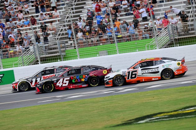 HAMPTON, GA - JULY 12: 11 Denny Hamlin, Joe Gibbs Racing, Clips Haircuts Toyota Camry, 45 Tyler Reddick, 23XI Racing, Chumba Casino Toyota Camry and 16 AJ Allmendinger, Kaulig Racing, Campers Inn RV Chevrolet Camaro race through the frontstretch during the NASCAR, Motorsport, USA Cup Series Quaker State 400 race on July 12, 2026 at EchoPark Speedway in Hampton, Georgia. (Photo by David J. Griffin Icon Sportswire) AUTO: JUL 12 NASCAR Cup Series Quaker State 400 EDITORIAL USE ONLY Icon9532607121408
