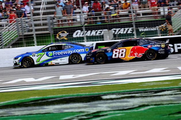 HAMPTON, GA - JULY 12: 7 Daniel Suarez, Spire Motorsports, Freeway Insurance Chevrolet Camaro battles 88 Connor Zilisch, Trackhouse Racing, Red Bull Chevrolet Camaro during the NASCAR, Motorsport, USA Cup Series Quaker State 400 race on July 12, 2026 at EchoPark Speedway in Hampton, Georgia. (Photo by David J. Griffin Icon Sportswire) AUTO: JUL 12 NASCAR Cup Series Quaker State 400 EDITORIAL USE ONLY Icon9532607121703