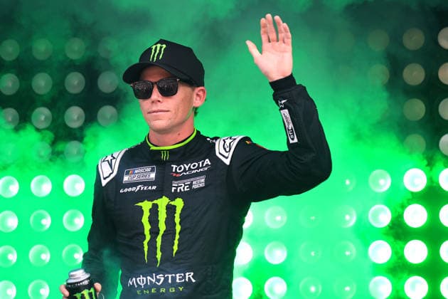 ATLANTA, GA - JULY 12: Riley Herbst ( 35 23XI Racing Monster Energy Toyota) waves to the crowd during driver introductions prior to the running of the NASCAR, Motorsport, USA Cup Series Quaker State 400 on July 12, 2026 at EchoPark Speedway in Hampton, GA. (Photo by Jeff Robinson Icon Sportswire) AUTO: JUL 12 NASCAR Cup Series Quaker State 400 EDITORIAL USE ONLY Icon26071211888400