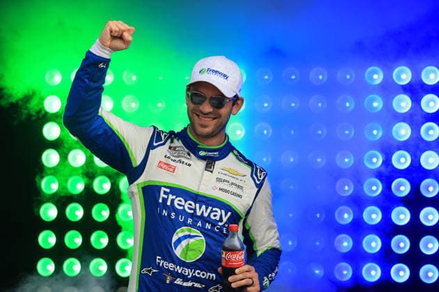 ATLANTA, GA - JULY 12: Daniel Suarez ( 7 Spire Motorsports Freeway Insurance Chevrolet) waves to the crowd during driver introductions prior to the running of the NASCAR, Motorsport, USA Cup Series Quaker State 400 on July 12, 2026 at EchoPark Speedway in Hampton, GA. (Photo by Jeff Robinson Icon Sportswire) AUTO: JUL 12 NASCAR Cup Series Quaker State 400 EDITORIAL USE ONLY Icon26071212571400