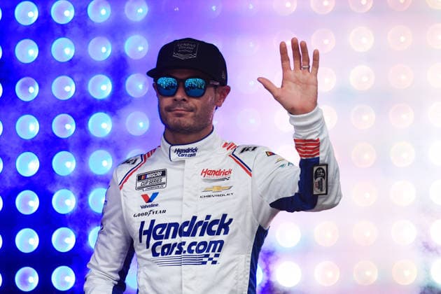 ATLANTA, GA - JULY 12: Kyle Larson ( 5 Hendrick Motorsports HendrickCars.com Chevrolet) waves to the crowd during driver introductions prior to the running of the NASCAR, Motorsport, USA Cup Series Quaker State 400 on July 12, 2026 at EchoPark Speedway in Hampton, GA. (Photo by Jeff Robinson Icon Sportswire) AUTO: JUL 12 NASCAR Cup Series Quaker State 400 EDITORIAL USE ONLY Icon26071212624400