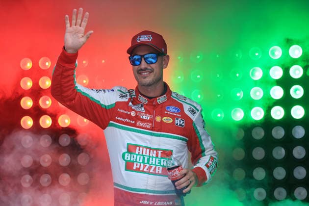 ATLANTA, GA - JULY 12: Joey Logano ( 22 Team Penske Hunt Brothers Pizza Ford) waves to the crowd during driver introductions prior to the running of the NASCAR, Motorsport, USA Cup Series Quaker State 400 on July 12, 2026 at EchoPark Speedway in Hampton, GA. (Photo by Jeff Robinson Icon Sportswire) AUTO: JUL 12 NASCAR Cup Series Quaker State 400 EDITORIAL USE ONLY Icon26071212676400