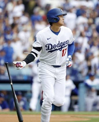 Baseball: Diamondbacks vs. Dodgers Los Angeles Dodgers designated hitter Shohei Ohtani watches his solo home run ball fly in the first inning of a baseball game against the Arizona Diamondbacks at Dodger Stadium in Los Angeles on July 12, 2026. It marked the 350th homer of his career spanning Nippon Professional Baseball and Major League Baseball.  A14AA0005622865P