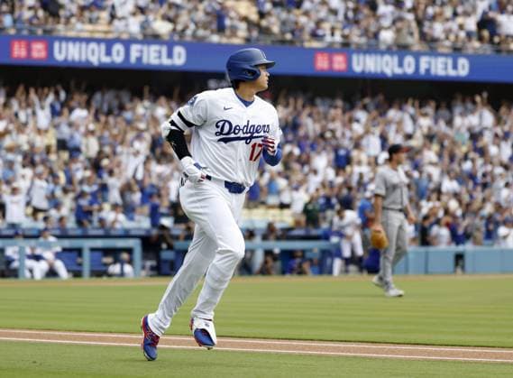 Baseball: Diamondbacks vs. Dodgers Los Angeles Dodgers designated hitter Shohei Ohtani rounds the bases after hitting a solo home run in the first inning of a baseball game against the Arizona Diamondbacks at Dodger Stadium in Los Angeles on July 12, 2026. It marked the 350th homer of his career spanning Nippon Professional Baseball and Major League Baseball.  A14AA0005622869P