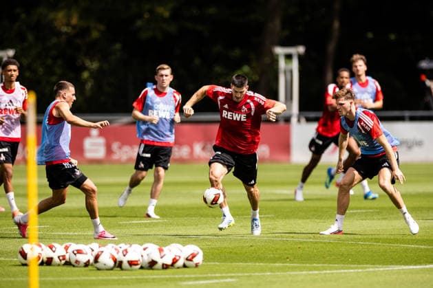 COLOGNE, GERMANY - JULY 13: Luka Lochoshvili (1. FC Koeln, 24) controls the ball against Said El Mala (1. FC Koeln, 13) and Marius Buelter (Bülter, Bulter, 1. FC Koeln, 30) during the first training session of season 2026 27 at Geissbockheim on July 13, 2026 in Cologne, Germany. North Rhine Westphalia Germany Copyright: xSteffiexWunderlx