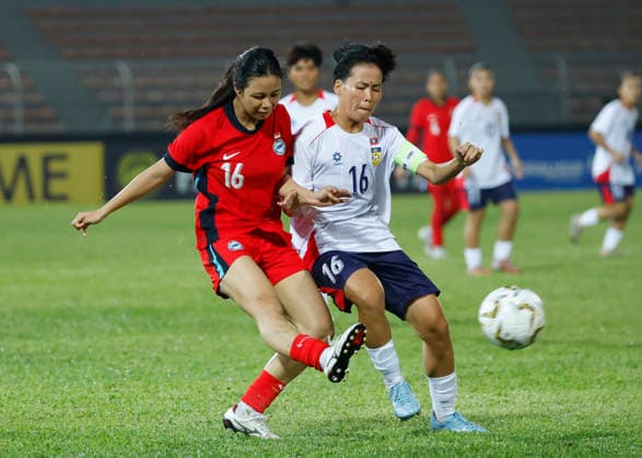 July 13, 2026, Kuala Lumpur, Malaysia: Nur Sarah of Singapore (L) and Saysamone Inthaphone of Laos seen in action during the AFF Women s Cup 2026 match between Singapore and Laos at Kuala Lumpur Football Stadium, Cheras. Final score Singapore 1 : 1 Laos AFF Women s Cup 2026 Singapore Vs Laos In Kuala Lumpur, Malaysia - 13 Jul 2026  - ZUMAs197 20260713_aaa_s197_211 Copyright: xWongxFokxLoyx