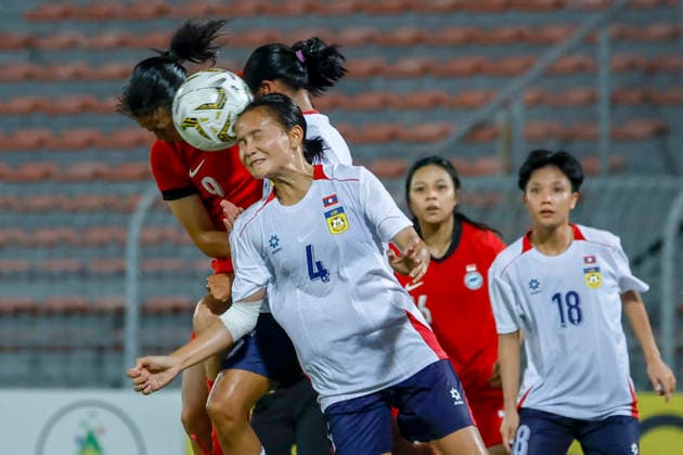 July 13, 2026, Kuala Lumpur, Malaysia: Vilayphone Phengsana of Laos (R) and Danelle Tan Li Ern of Singapore (L) seen in action during the AFF Women s Cup 2026 match between Singapore and Laos at Kuala Lumpur Football Stadium, Cheras. Final score Singapore 1 : 1 Laos Kuala Lumpur Malaysia - ZUMAs197 20260713_aaa_s197_218 Copyright: xWongxFokxLoyx