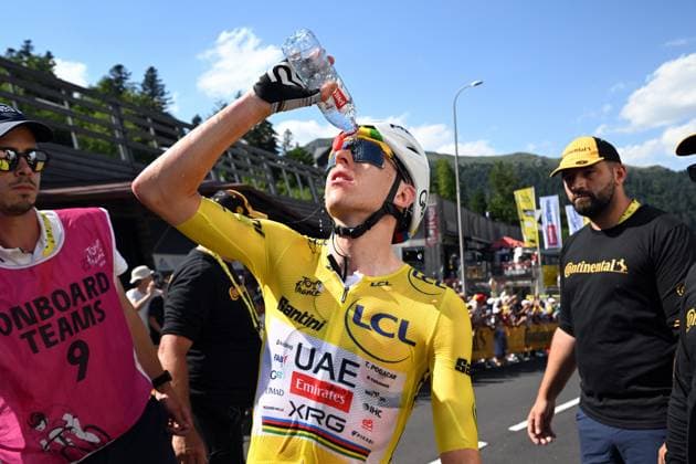 Slovenian Tadej Pogacar of UAE Team Emirates-XRG celebrates after winning the stage 10 of the 2026 Tour de France cycling race, a stage of 167km from Aurillac to Le Lioran, on Tuesday 14 July 2026. The 113th edition of the Tour de France starts on Saturday 4 July in Barcelona, Spain, and will finish in Paris, France on the 26th of July. POOLxSZYMONxGRUCHALSKI  x181133065x