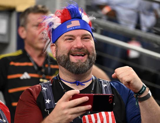 (260715) -- DALLAS, July 15, 2026 -- A fan reacts before the semifinal match between France and Spain at the 2026 FIFA World Cup, WM, Weltmeisterschaft, Fussball at Dallas Stadium in Dallas, the United States, July 14, 2026. ) (SP)U.S.-DALLAS-FOOTBALL-FIFA WORLD CUP-SEMIFINAL-FRA VS ESP ChenxYichen 