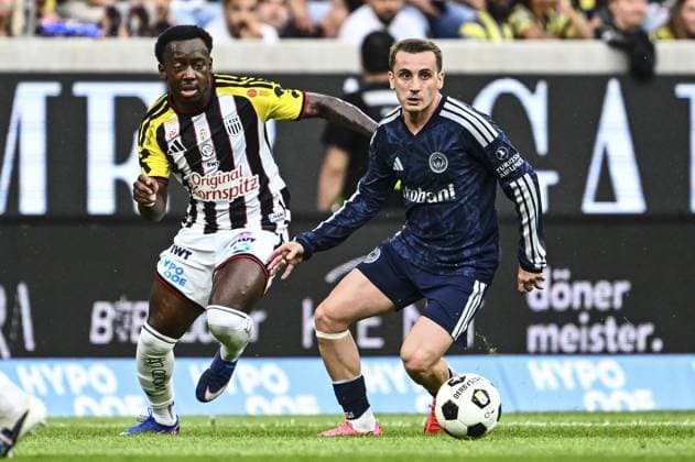 LASK Linz v Fenerbahce - Friendly LINZ, AUSTRIA - JULY 14: LASK Linz s George Bello (L) and Fenerbahce s Kerem Akturkoglu (R) battle for the ball during a friendly match as part of Fenerbahce s pre-season training camp at Raiffeisen Arena in Linz, Austria, on July 14, 2026. Agit Erdi Ulukaya Anadolu Linz Austria. Editorial use only. Please get in touch for any other usage.  Copyright: x2026xAnadoluxAgitxErdixUlukayax