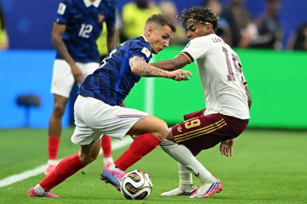 FIFA World Cup, WM, Weltmeisterschaft, Fussball 2026 semifinals - France vs Spain Lucas Digne of France (L) in action against Lamine Yamal of Spain (R) during the FIFA World Cup 2026 semifinals match France against Spain, in Dallas, Texas, USA, 14 July 2026. DALLAS United States  Copyright: xALBERTxPENAx