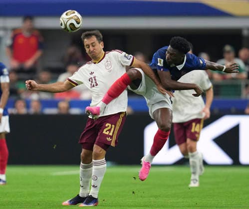 (260715) -- DALLAS, July 15, 2026 -- Mikel Oyarzabal (L) of Spain vies with Aurelien Tchouameni of France during the semifinal match between France and Spain at the 2026 FIFA World Cup, WM, Weltmeisterschaft, Fussball at Dallas Stadium in Dallas, the United States, July 14, 2026. ) (SP)U.S.-DALLAS-FOOTBALL-FIFA WORLD CUP-SEMIFINAL-FRA VS ESP WuxXiaoling 