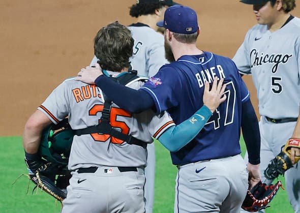 American League closing pitcher Bryan Baker and catcher Adley Rutschman celebrate after defeating the National League 4-0 in the 2026 MLB, Baseball Herren, USA All-Star Game at Citizens Bank Park in Philadelphia, Pennsylvania, on Tuesday, July 14, 2026.  PHI20260714955 LAURENCExKESTERSON