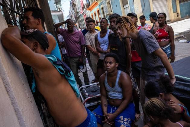 Cubans watch semi final Spain France HAVANA, CUBA JULY 14, 2026: Residents watch the FIFA World Cup, WM, Weltmeisterschaft, Fussball semi-final between Spain and France at a bar powered by a generator during the fifth nationwide blackout that left much of Cuba without electricity in Havana, Cuba, on July 14, 2026. Havana Cuba Copyright: x xAntonioxCasciox xJNAxPressx