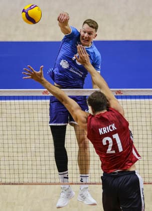 Men s Volleyball Nations League - Belgrade 2026 Slovenia s Rok Mozic spikes the ball against Germany s Tobias Krick during the MenÕs Volleyball Nations League Pool 7 match between Germany and Slovenia at Belgrade Arena on July 15, 2026 in Belgrade, Serbia. Belgrade Serbia Copyright: xSrdjanxStevanovicx x