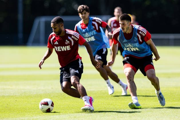 COLOGNE, GERMANY - JULY 15: Linton Maina (1. FC Koeln, 37) controls the ball against Luka Lochoshvili (1. FC Koeln, 24) during a training session of season 2026 27 at Geissbockheim on July 15, 2026 in Cologne, Germany. North Rhine Westphalia Germany Copyright: xSteffiexWunderlx
