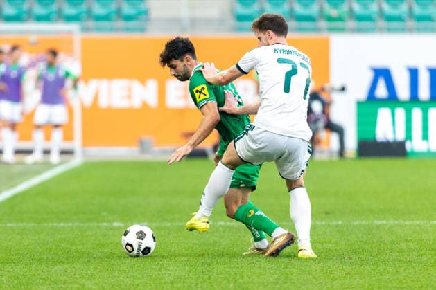 SOCCER - Rapid vs Panathinaikos, test match VIENNA,AUSTRIA,15.JUL.26 - SOCCER - ADMIRAL Bundesliga, Super League, SK Rapid Wien vs Panathinaikos Athen, test match. Image shows Yusuf Demir (Rapid) and Georgios Kyriakopoulos (Panathinaikos).  GEPAxpictures xPhilippxBrem