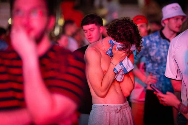 July 15, 2026, Manchester, United Kingdom: An England fan seen covering his face after England lost 2-1 to Argentina in the World Cup semi-final. The sold-out Castlefield Bowl, organised by The Road Victory, saw thousands of fans come together to watch England play Argentina in a World Cup battle for the first time since France 98. Manchester United, ManU Kingdom - ZUMAs197 20260715_aaa_s197_173 Copyright: xAndyxBartonx