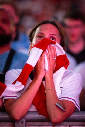 July 15, 2026, Manchester, United Kingdom: An England fan seen covering her mouth after England lost 2-1 to Argentina in the World Cup semi-final. The sold-out Castlefield Bowl, organised by The Road Victory, saw thousands of fans come together to watch England play Argentina in a World Cup battle for the first time since France 98. Manchester United, ManU Kingdom - ZUMAs197 20260715_aaa_s197_175 Copyright: xAndyxBartonx