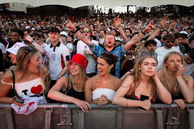 July 15, 2026, Manchester, United Kingdom: England fans seen celebrating after taking the lead during the highly anticipated World Cup semi-final. The sold-out Castlefield Bowl, organised by The Road Victory, saw thousands of fans come together to watch England play Argentina in a World Cup battle for the first time since France 98. England Vs Argentina World Cup Semi Final In Manchester, UK - 15 JULY 2026.  - ZUMAs197 20260715_aaa_s197_178 Copyright: xAndyxBartonx