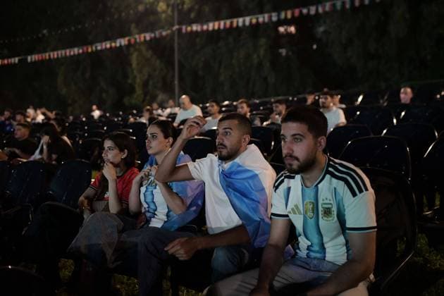 July 15, 2026, Ramat-Gan, Israel: RAMAT GAN, ISRAEL oÃ¢ JULY 15, 2026: People gather at an open-air amphitheatre in the National Park in Ramat Gan, Israel, to watch the FIFA World Cup, WM, Weltmeisterschaft, Fussball 2026 semi-final match between England and Argentina on a giant screen on July 15, 2026. The public viewing drew football fans who followed the match together as part of the tournament celebrations. JNA PRESS Ramat-Gan Israel  - ZUMAq101 20260715_zna_q101_241 Copyright: xTomerxNeubergx Fans Watch England-Argentina World Cup Semi-Final In Ramat Gan  - ZUMA0861 0861753884st Copyright: xIMAGO TomerxNeubergx
