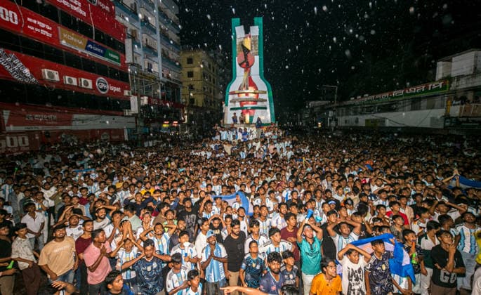 July 16, 2026, Dhaka, Munshiganj, Bangladesh: Thousands of football fans gathered at Super Market Chottor in Munshiganj, Dhaka, Bangladesh, on Tuesday night to watch the FIFA World Cup, WM, Weltmeisterschaft, Fussball 2026 semi-final between Argentina and England on giant screens. The public viewing attracted a large crowd as supporters followed one of the tournament s most anticipated matches. Argentina secured a dramatic 2Ã¢â‚¬1 victory with two late goals to book their place in the FIFA World Cup Final, while England s campaign came to an end after a spirited performance. The photographs capture the excitement, tension and emotions of football fans in Bangladesh as they witnessed Argentina s memorable comeback and qualification for the final. Bangladesh Football Fans Watch Argentina Defeat England To Reach The FIFA World Cup 2026 Final  - ZUMAa259 0861759580st Copyright: xRayhanxAhmedx