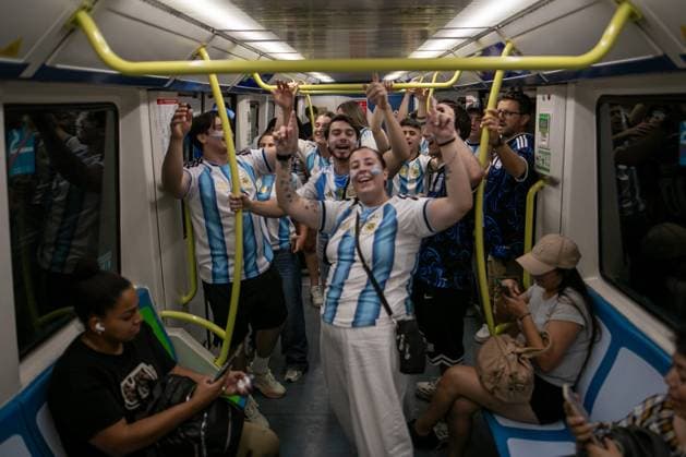 July 16, 2026, Madrid, Madrid, Spain: Argentine fans celebrate in a Madrid metro car..Argentine football fans celebrate their team s qualification for the 2026 FIFA World Cup, WM, Weltmeisterschaft, Fussball final in Madrid s Puerta del Sol square after defeating England 2-1 in the semi-final...Argentina will face Spain in New York on Sunday, July 19. Argentine Fans Celebrate In Madrid Their Advancement To The 2026 World Cup Final.  - ZUMAs197 0861766201st Copyright: xSOPAxImagesx