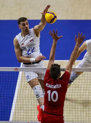 Men s Volleyball Nations League - Belgrade 2026 Serbia s Veljko Masulovic spikes the ball against Turkey s Mirza Lagumdzija during the MenÕs Volleyball Nations League Pool 7 match between Serbia and Turkiye at Belgrade Arena on July 15, 2026 in Belgrade, Serbia. Belgrade Serbia Copyright: xSrdjanxStevanovicx x