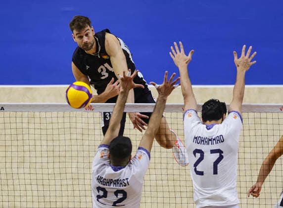 WomenÕs Volleyball Nations League - Belgrade 2026 Germany s Yann Bohme spikes the ball against IranÕs Ali Haghparast and IranÕs Mohammad Valizadeh during the MenÕs Volleyball Nations League Pool 7 match between Germany and Iran at Belgrade Arena on July 16, 2026 in Belgrade, Serbia. Belgrade Serbia Copyright: xSrdjanxStevanovicx x