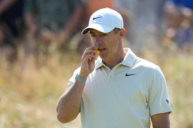 SOUTHPORT, ENGLAND - JULY 16: Rory McIlroy (NIR) protects his lips from the heat on the 1st green during Round 1 of the 154th Open Championship at the Royal Birkdale Golf Club, Southport on July 16, 2026 in Merseyside, England The 154th British Open Championship