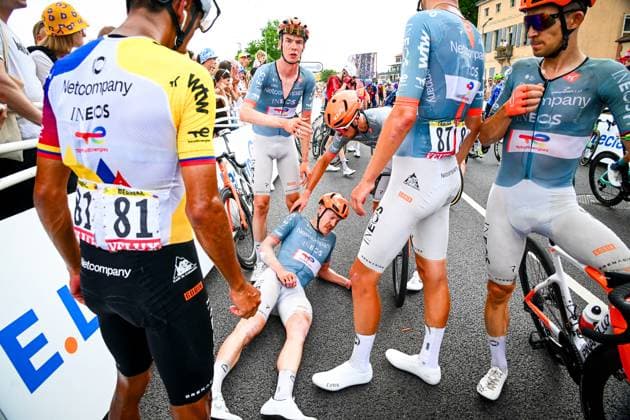 French Dorian Godon of Netcompany-INEOS is surrounded by teammates while being injured at the end of the stage 12 of the 2026 Tour de France cycling race, a stage of 181km from Nevers Magny-Cours to Chalon-sur-Saone, on Thursday 16 July 2026. The 113th edition of the Tour de France starts on Saturday 4 July in Barcelona, Spain, and will finish in Paris, France on the 26th of July. POOLxLUCAxBETTINI  x181278516x