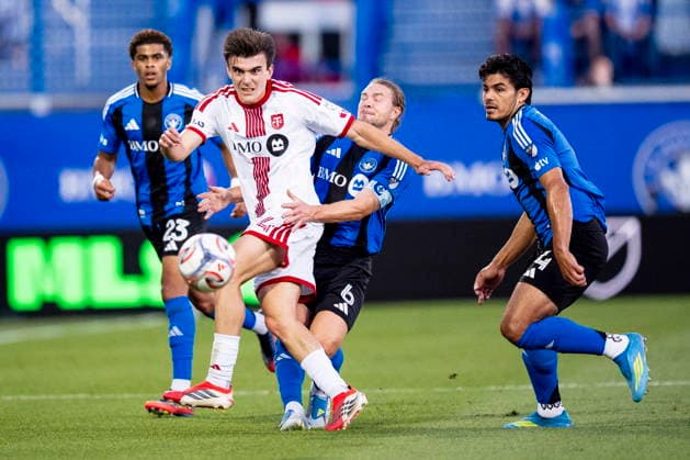 July 16, 2026, Montreal, Pq, Canada: Toronto FC s Alonso Coello (14) is defended by CF Montreal s Samuel Piette (6) during first half MLS, Fussball Herren, USA soccer action, in Montreal on Thursday, July 16, 2026. Canada News - July 16, 2026  - ZUMAc35_ 20260716_zaf_c35_124 Copyright: xChristopherxKatsarovx