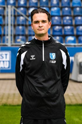 Teammanager Charles Marcus, 1. FC Magdeburg - 2. Fussball Bundesliga Porträttermin 2. BL 2026 2027 offizieller Fototermin 1. FC Magdeburg in der Avnet Arena in Magdeburg - Porträt, Portrait, Einzelbild, Deutschland, Fussball, Maenner, GER, 16.07.2026 *** Team Manager Charles Marcus, 1. FC Magdeburg, 2. Bundesliga, Portrait Session, 2026–2027 Season, Official Photo Session, 1. FC Magdeburg at the Avnet Arena in Magdeburg, Portrait, Individual Photo, Germany, Soccer, Men, GER, July 16, 2026 Christian Schroedter