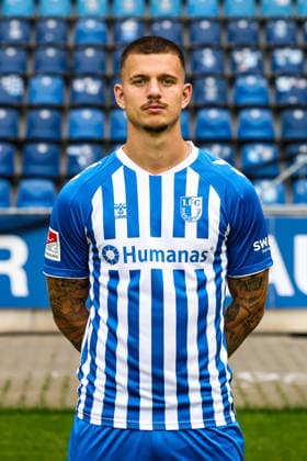 Mateusz Zukowski, 1. FC Magdeburg - 2. Fussball Bundesliga Porträttermin 2. BL 2026 2027 offizieller Fototermin 1. FC Magdeburg in der Avnet Arena in Magdeburg - Porträt, Portrait, Einzelbild, Deutschland, Fussball, Maenner, GER, 16.07.2026 *** Mateusz Zukowski, 1. FC Magdeburg, 2. Bundesliga, portrait session, 2026–2027 season, official photo shoot, 1. FC Magdeburg at the Avnet Arena in Magdeburg, portrait, individual photo, Germany, soccer, Men, GER, July 16, 2026 Christian Schroedter