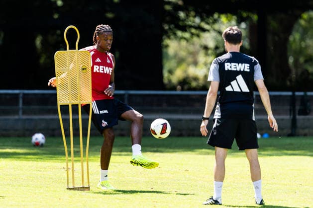 COLOGNE, GERMANY - JULY 16: Elias Bakatukanda (1. FC Koeln) training individually with Leif Frach (Athletics Coach 1. FC Koeln) during a training session of season 2026 27 at Geissbockheim on July 16, 2026 in Cologne, Germany. North Rhine Westphalia Germany Copyright: xSteffiexWunderlx