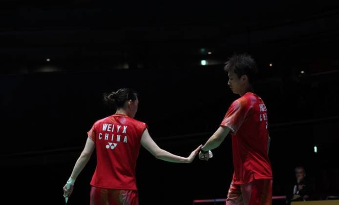 (260717) -- TOKYO, July 17, 2026 -- Jiang Zhenbang (R) Wei Yaxin react during the mixed doubles quarterfinal match between Jiang Zhenbang Wei Yaxin of China and Tang Chun Man Tse Ying Suet of China s Hong Kong at the Japan Badminton Open 2026 in Tokyo, Japan, July 17, 2026. ) (SP)JAPAN-TOKYO-BADMINTON-JAPAN OPEN 2026-MIXED DOUBLES-QUARTERFINALS YuexChenxing 